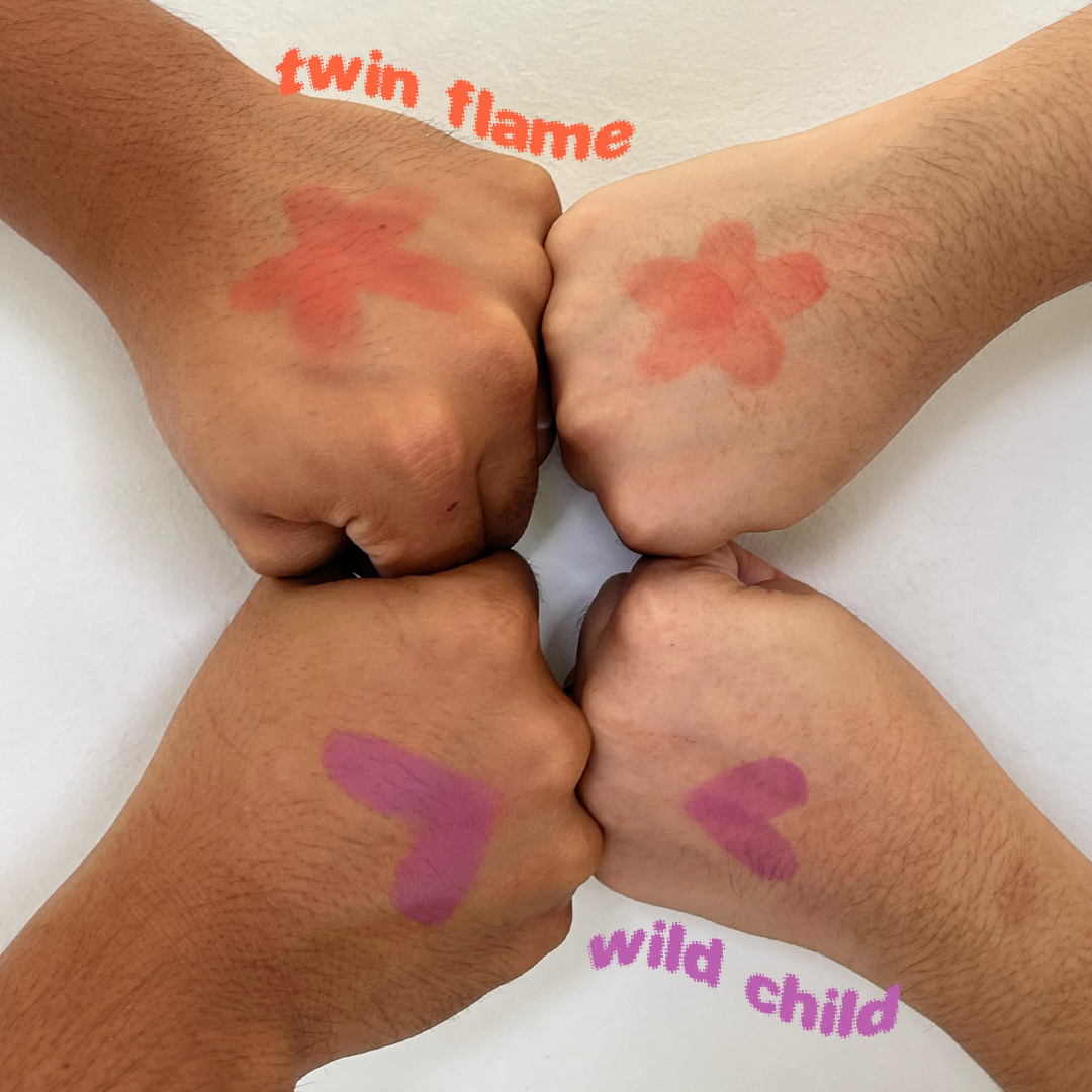 Swatches of both Twin Flame and Wild Child on dark and medium skin tones.